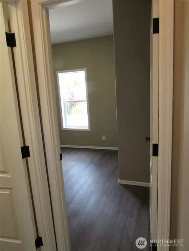 OTHER END OF HOME, SPARE BEDROOM ENTRY.