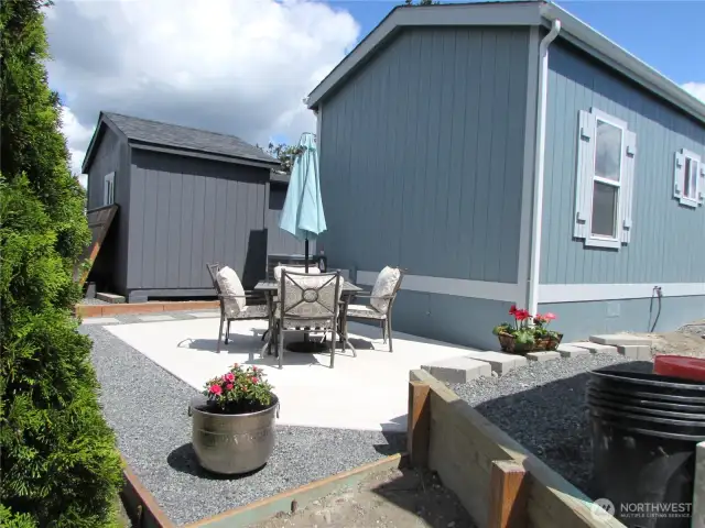 BRAND NEW, SEMI-PRIVATE CEMENT PATIO W/ GOOD SOUTHERN EXPOSURE FOR GARDEN AREA, IF DESIRED.
