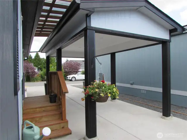 NEW CARPORT (LIKE THIS ONE NEXT DOOR) WILL BE INSTALLED WITHIN 90 DAYS OF CLOSING.