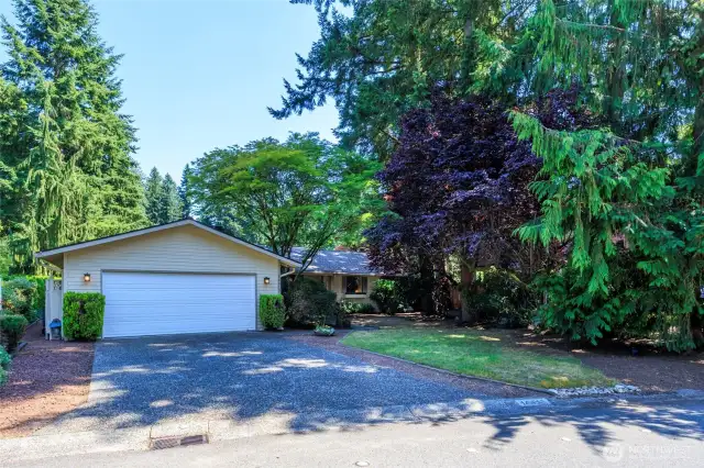 Peaceful wooded setting in Huckleberry near Mill Creek Country Club.