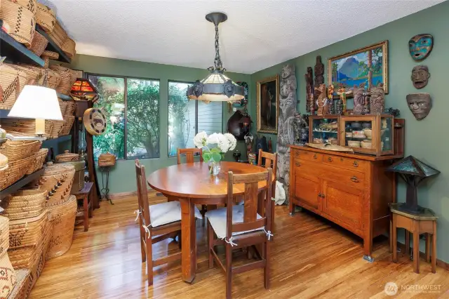 Formal dining room with bamboo floors is perfect for enjoying large gatherings.