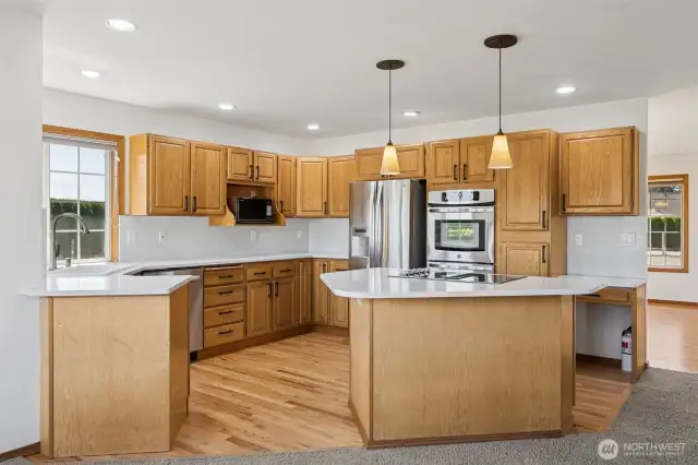 Updated granite island kitchen with double oven