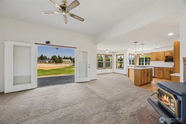 Family room with views of the patrue and Mt. Views