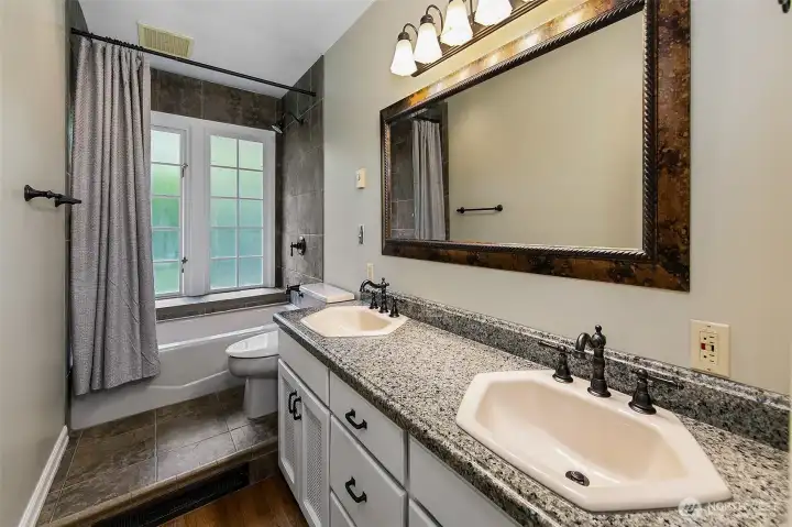 Main floor full bathroom for the 2 bedrooms there