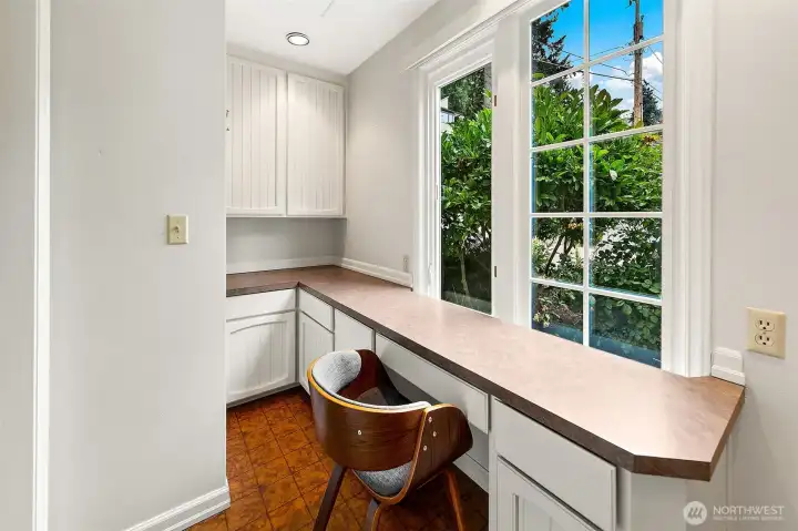 Additional office area and kids workroom, homework space or crafting.