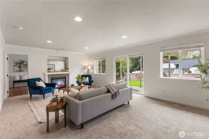 The large family room has a gas fireplace for those chilly evenings when you just want to snuggle up on the couch.