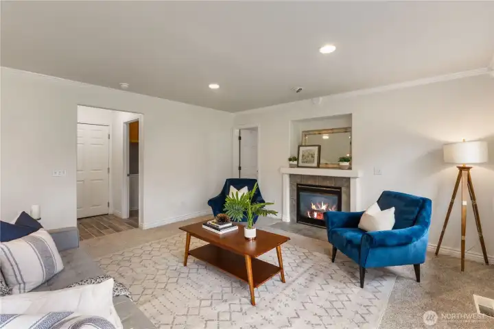 To the left is access to the powder room, garage and laundry room. Through the far door is access to the office/4th bedroom.