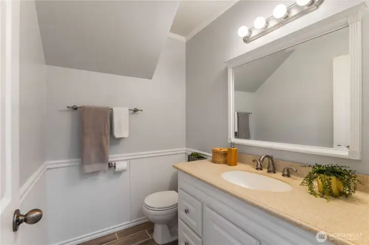 The home has a large and convenient powder room for guests.