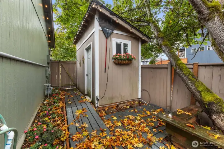 Shed #2 on the side of the house is perfect for your lawnmower and garden tools.