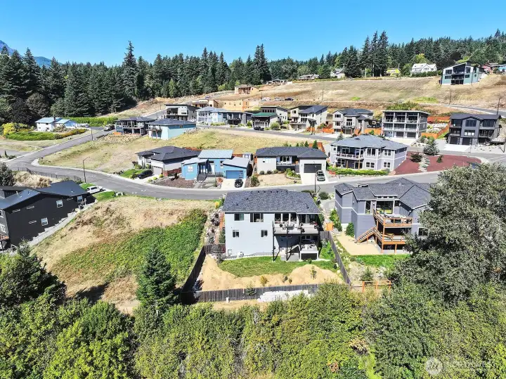 Drone view of the back yard and back side of the home.  Upgrades to the landscape in the backyard have been finished since these pictures were taken.
