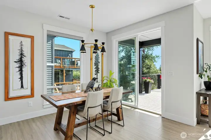 Eating area off the kitchen with access to the upper deck area outside - partially covered with amazing views.