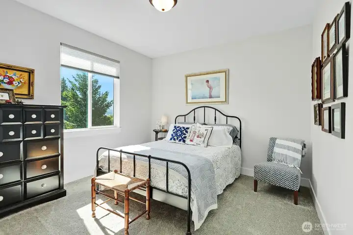 Second bedroom perfect for guests located on the lower floor.