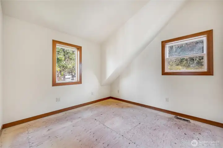 Multi-purpose room could be office or TV room