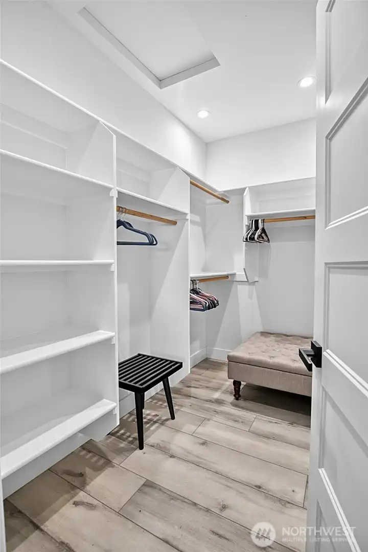 Primary Walk-In Closet with Custom Built-Ins