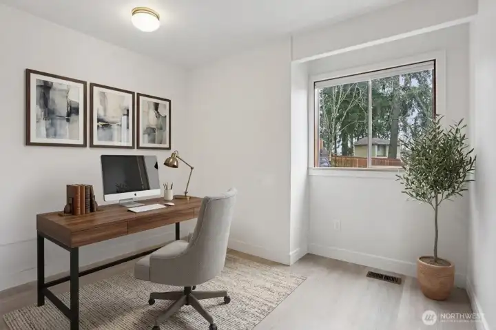 Main floor bonus room. Virtually staged