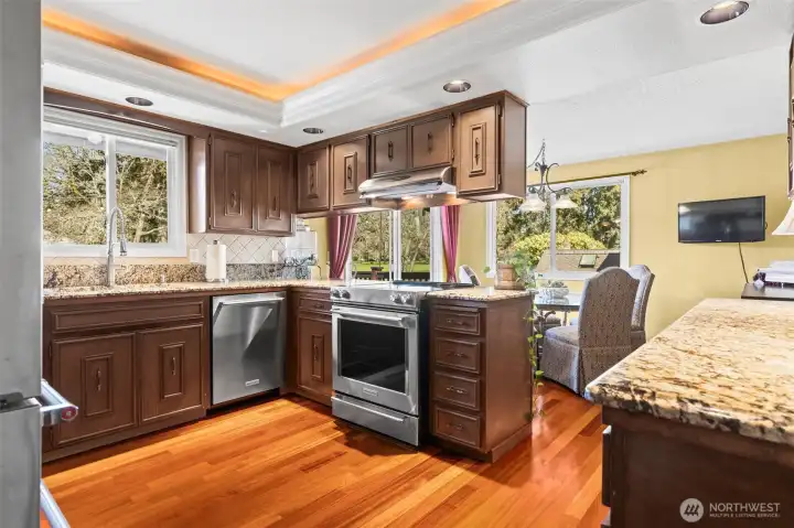 Kitchen with eat in dining space and slider to deck