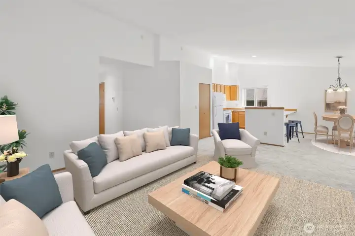 Vaulted ceilings in the great room bring in the light -- spacious and bright living space! (Virtually staged)