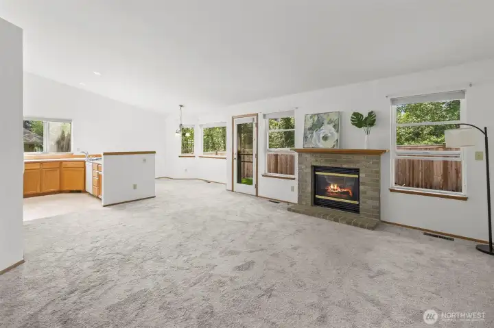So many windows in the living space to showcase the peaceful setting.