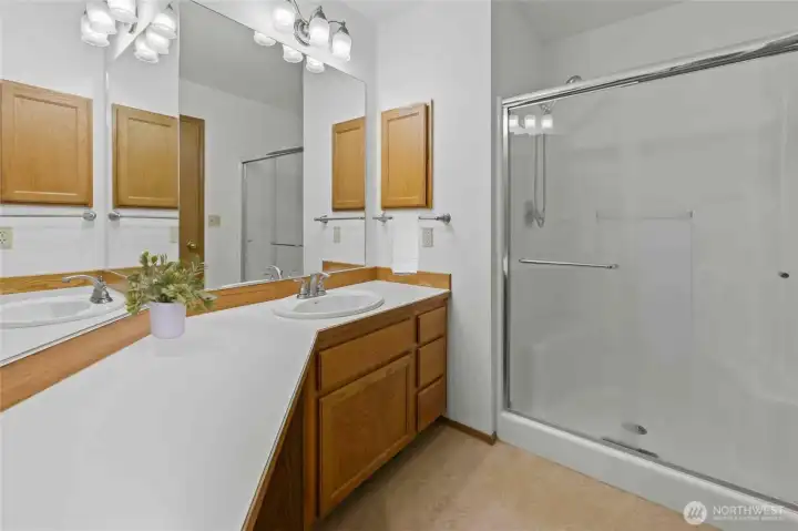 Primary en suite is spacious with extra counter/vanity space and roomy shower.