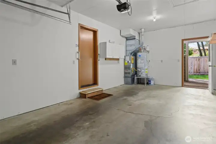 Garage with exit to the backyard.