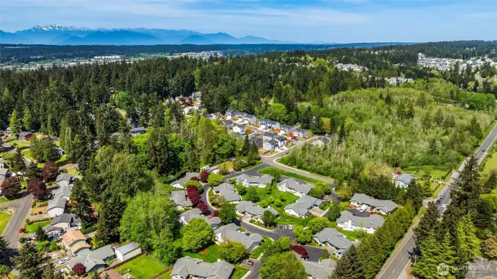Peaceful, tucked away neighborhood yet just minutes from both Bremerton and Silverdale and all the shopping, dining and more. Mature trees surround you, yet it's a sunny spot.