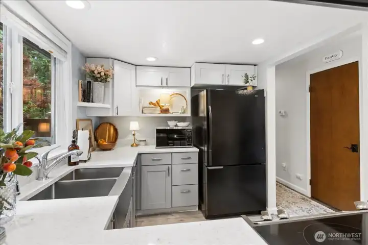 Looking into the kitchen from Dining area.