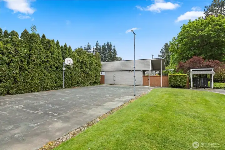 Basketball court and secured mailbox. Located on East side of complex as you drive in.