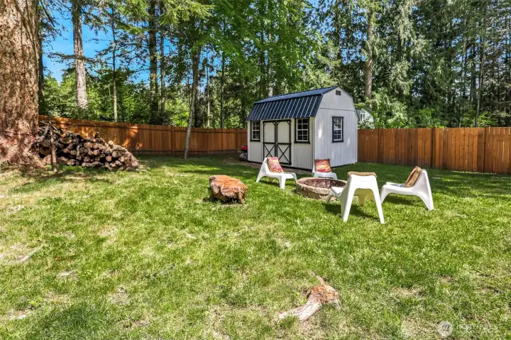 outdoor firepit and shed
