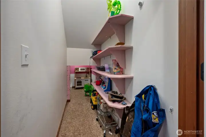 Under the stairs storage has been lovingly turned in a children's play area. Under the stairs storage has been lovingly turned in a children's play area.