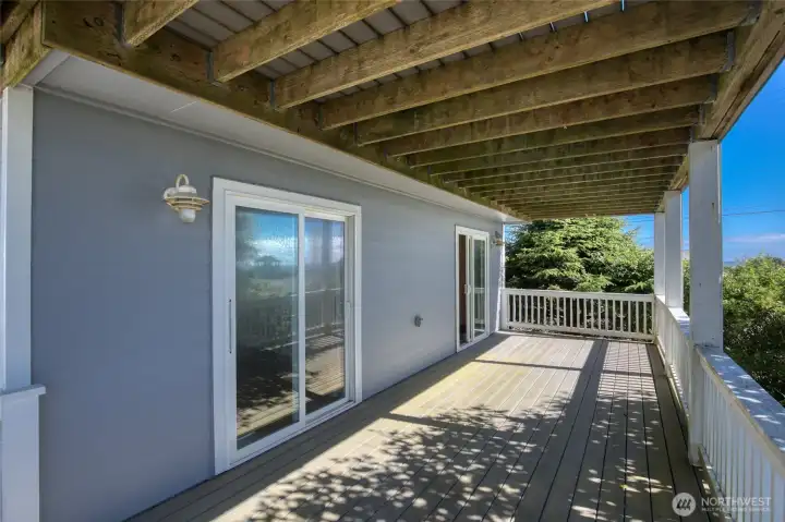 The two guest bedrooms lead out to a deck perfect for your morning coffee.