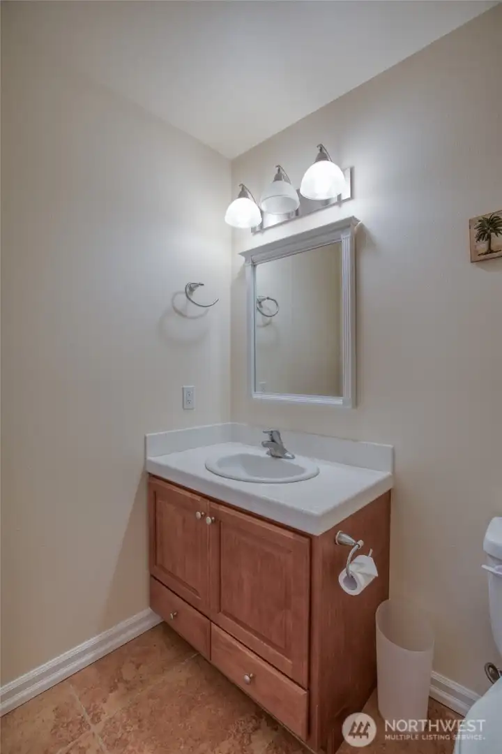 Downstairs hall bath...