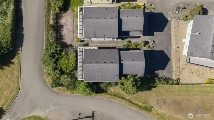 This home sits on the corner.  There is an easement on the west side that belongs to the Navy for utilities.