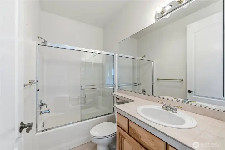 Upstairs full bathroom. Upstairs full bathroom.