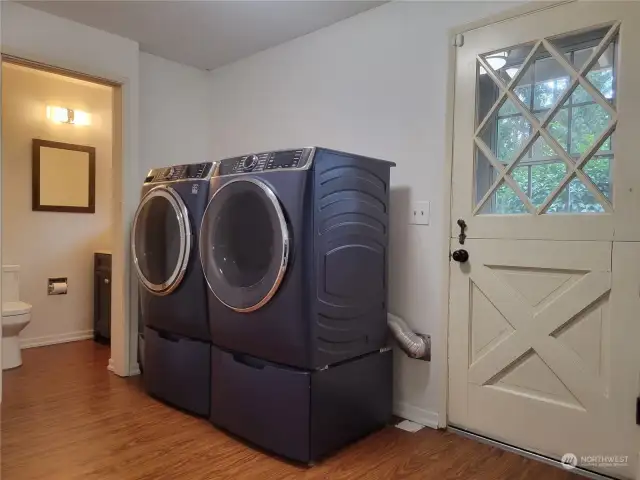 Brand new washer and dryer, peek at half bathroom