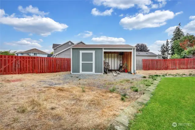 Closer view of the outbuilding and large amount of room you have to store an rv, trailer, boat, or?