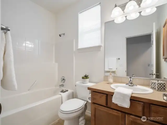 The guest bath has a nice tub and gives your guests privacy during their stay.