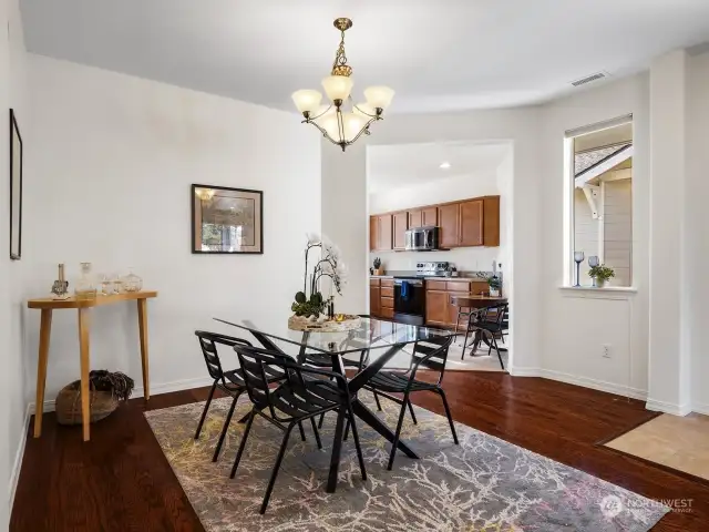 Have a nice dinner with friends in this open dining room. This home is made for entertainment.