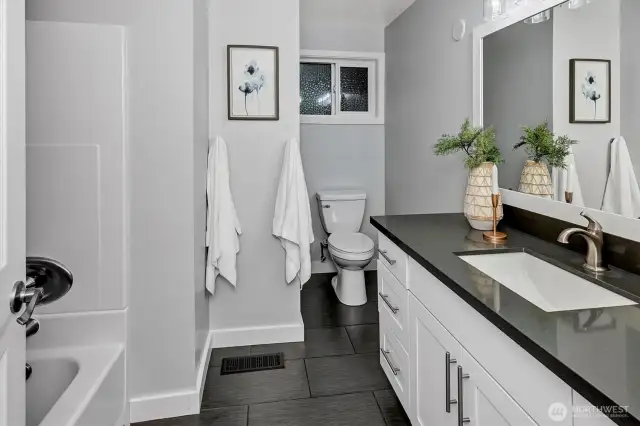 Updated bathrooms throughout.
