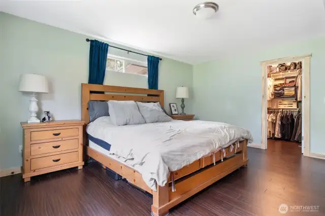 Master bedroom with private bathroom and large walk-in closet