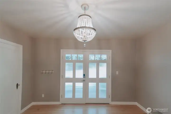 gorgeous french doors with reed glass, crystal chandelier