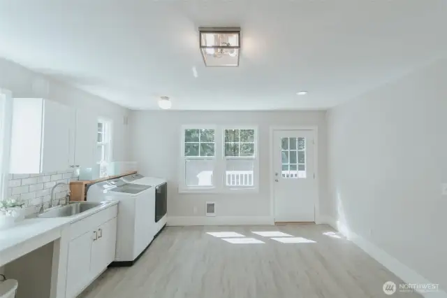 super sized laundry, crafting space with a deck to sit outside and listen to the birds tweet