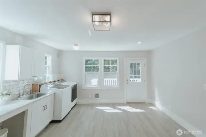 super sized laundry, crafting space with a deck to sit outside and listen to the birds tweet