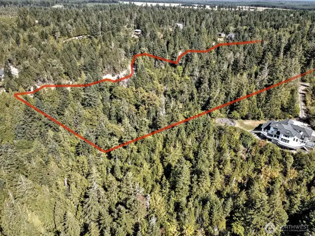 With the terrain issues and the height restrictions of drone flying, the photographer was only able to get pieces of the property at a time...lines are approximate.