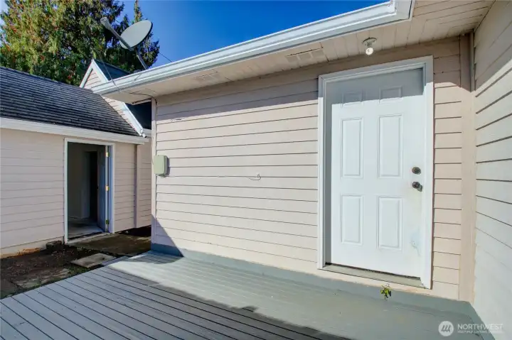 Private rear deck fenced with access to garage bonus room