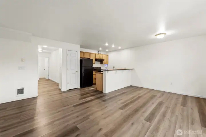 Open living+dining area with kitchen