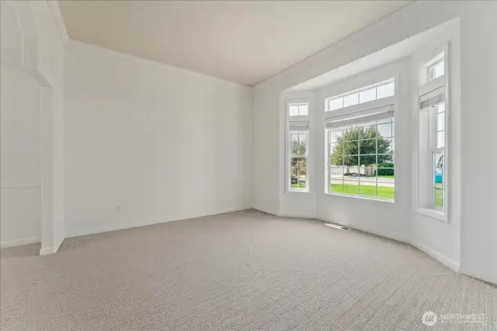 Large room off of kitchen could be used as a second TV or living room, play room zone, hobby zone, etc.