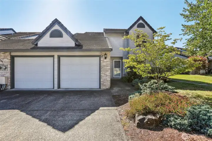 2 parking spaces in front of garage