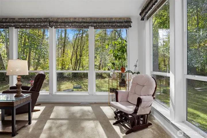 Living room with lots of natural lighting.