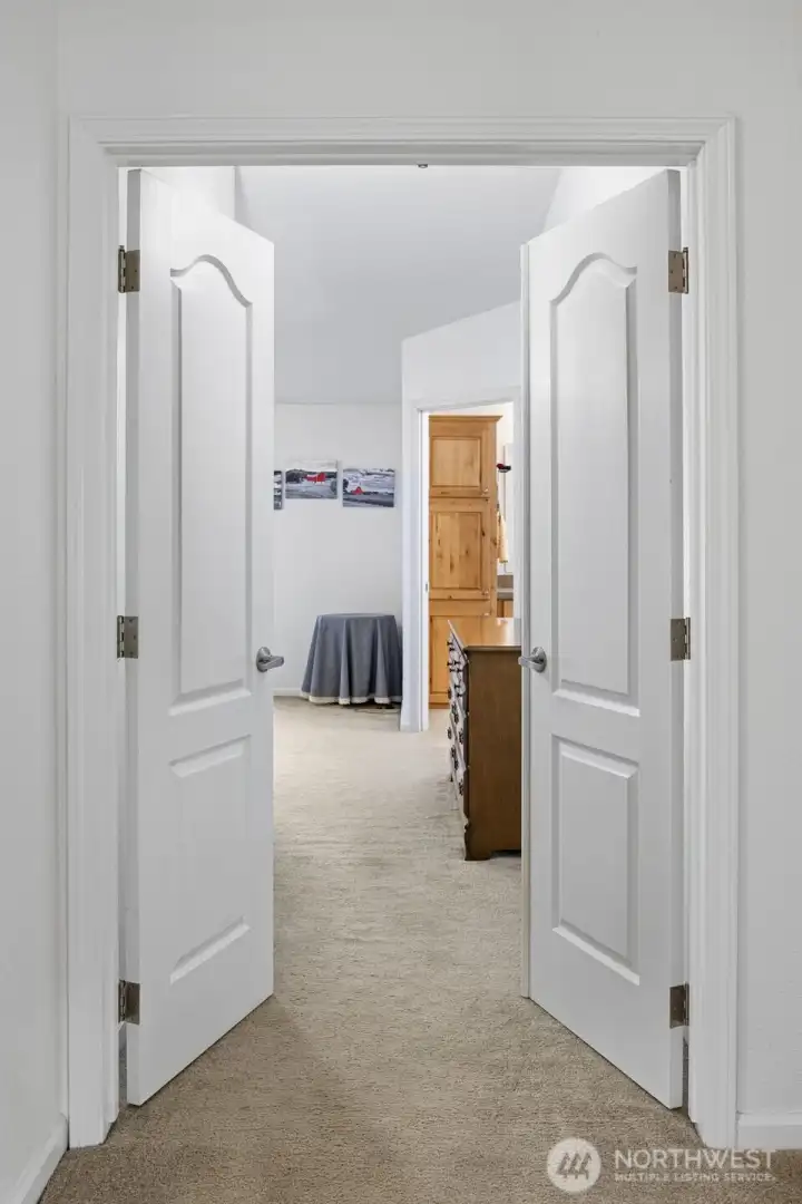 Primary bedroom entry with french doors