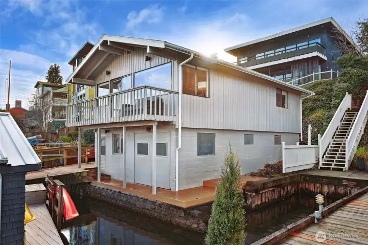 Park in one of your two parking spaces above and stroll down the path to your waterside retreat at 3012 Fuhrman Ave E #A.  Storage for kayaks, SUP, hover boards, and more. The space is 20 x 5.5" and more inside the unfinished basement.